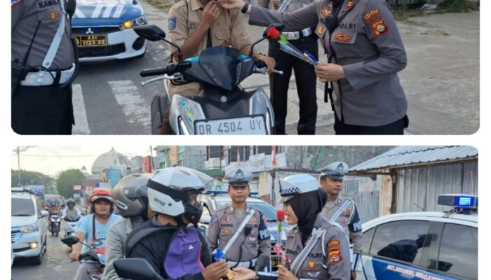 Sambut HUT Polwan Ke – 76, Polwan Polres Loteng Bagikan Bunga dan Coklat Kepada Pengendara.